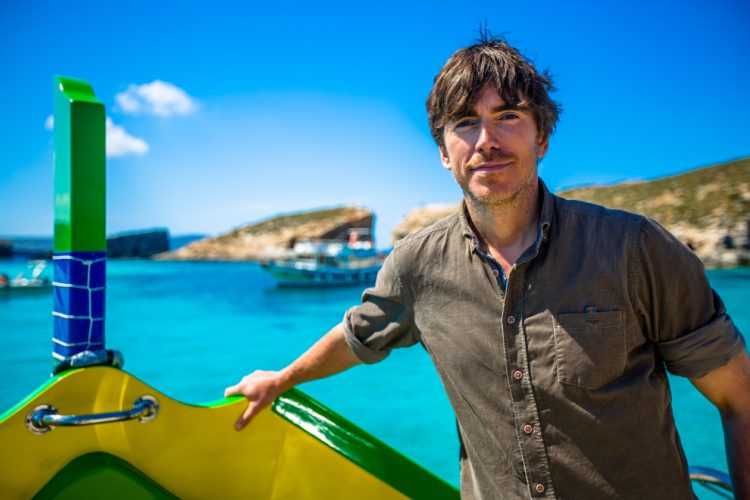 Picture shows_Presenter Simon Reeve in Malta’s Blue Lagoon