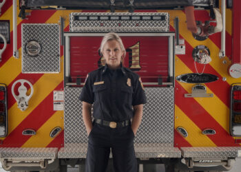 Paradise, CA - Shawna Powell, Cal Fire Northern Region Peer Support Battalion Chief, stands in front of a Paradise Fire Department fire truck. (National Geographic/Sarah Soquel Morhaim)