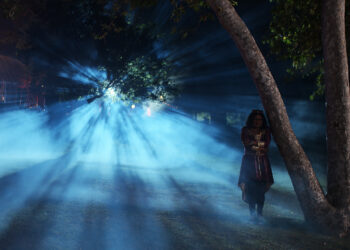 Shanti (Belissa Escobedo) in a scene from the "Rubber (Wo)man: Part Two" episode of AMERICAN HORROR STORIES.