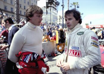 STREETS OF LONG BEACH, UNITED STATES OF AMERICA - APRIL 04: Didier Pironi and Gilles Villeneuve talk in the Ferrari pit during the United States GP West at Streets of Long Beach on April 04, 1982 in Streets of Long Beach, United States of America. (Photo by Rainer Schlegelmilch)