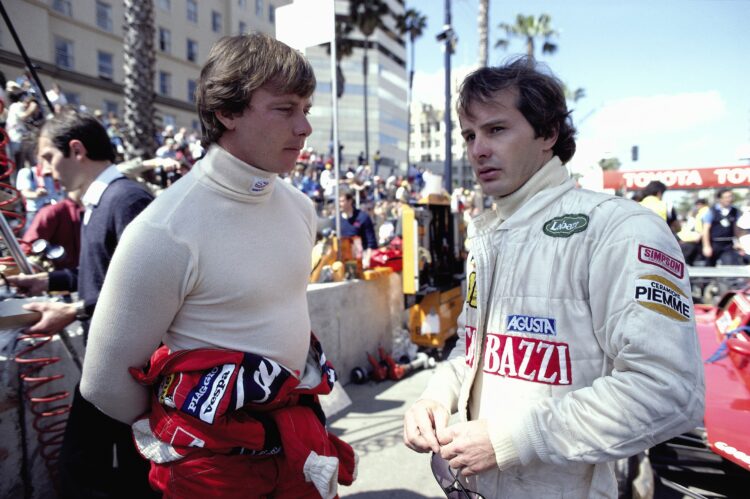 STREETS OF LONG BEACH, UNITED STATES OF AMERICA - APRIL 04: Didier Pironi and Gilles Villeneuve talk in the Ferrari pit during the United States GP West at Streets of Long Beach on April 04, 1982 in Streets of Long Beach, United States of America. (Photo by Rainer Schlegelmilch)