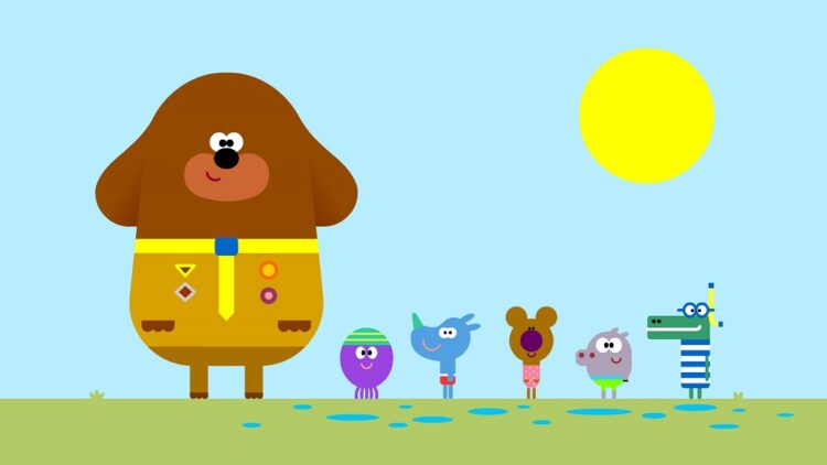 Picture Shows: Duggee stood next to the Squirrels standing in their swimsuits